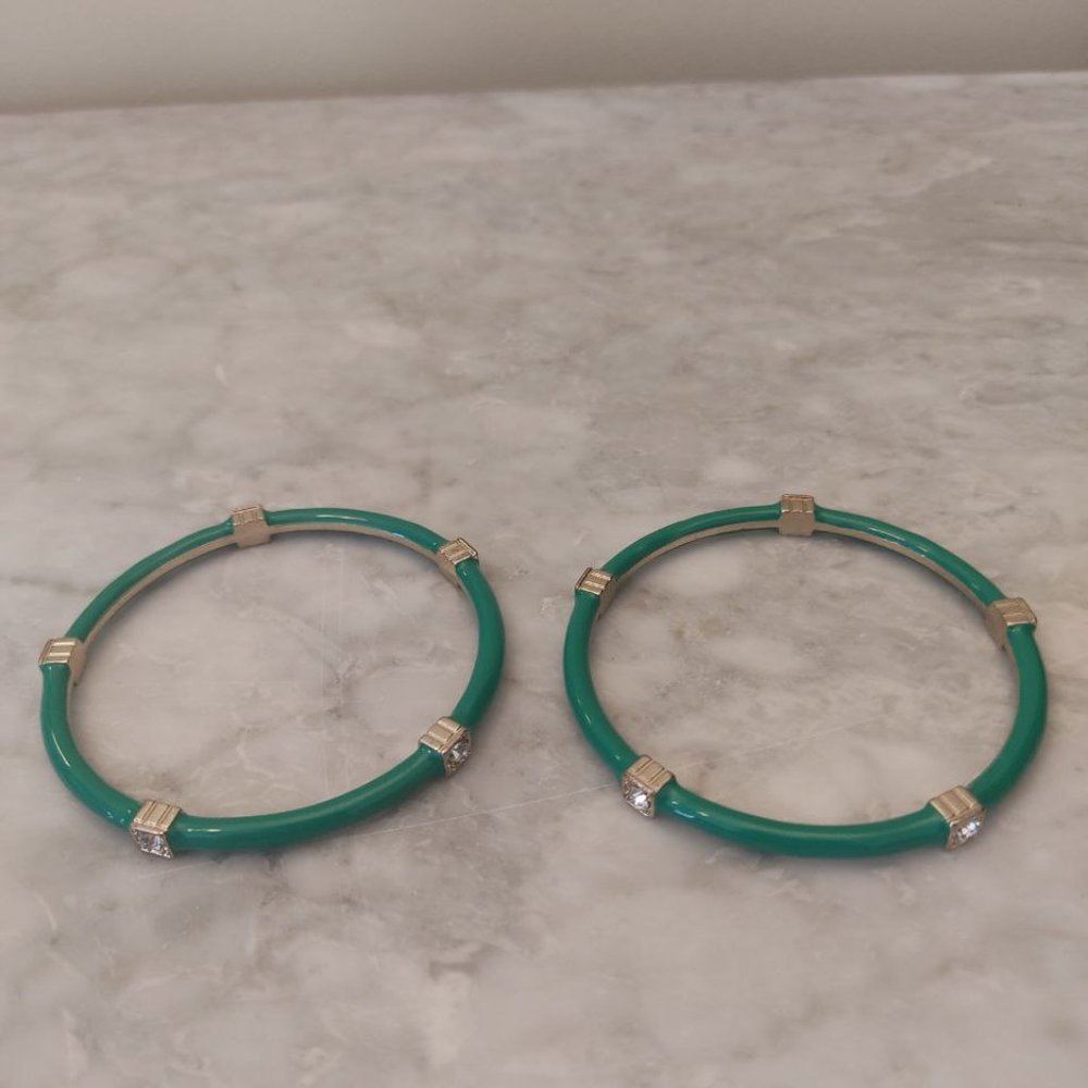 Pair of green gold bracelets